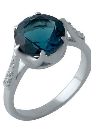 Серебряное кольцо komilfo с топазом лондон блю 3.089ct, вес изделия 4,18 гр (2012412) 17.5 размер
