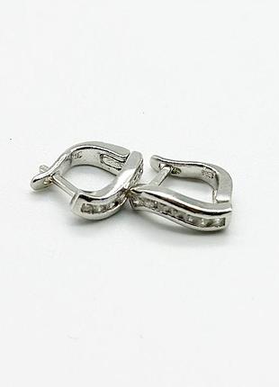 Серебряные серьги родированные с английской застежкой со вставкой фианит