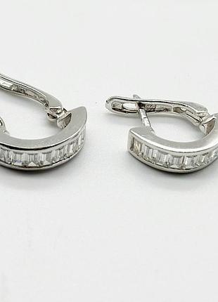Серебряные серьги родированные с английской застежкой со вставкой фианит