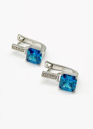 Серебряные серьги родированные с английской застежкой со вставкой фианит