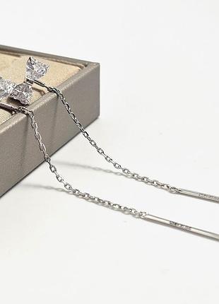 Серебряные серьги-гвоздики с бантиками и сердечками из цирконов