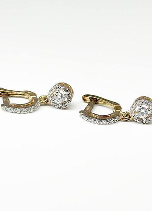 Серебряные серьги позолоченные с английской застежкой со вставкой фианит