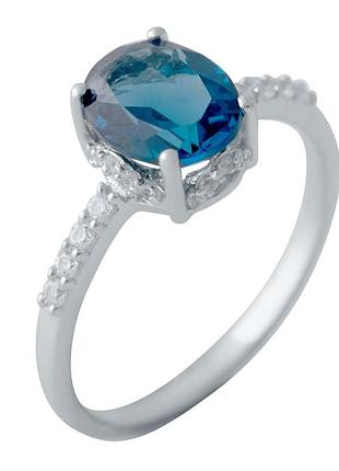 Серебряное кольцо komilfo с топазом лондон блю 2.01ct, вес изделия 2,17 гр (2041207) 18 размер