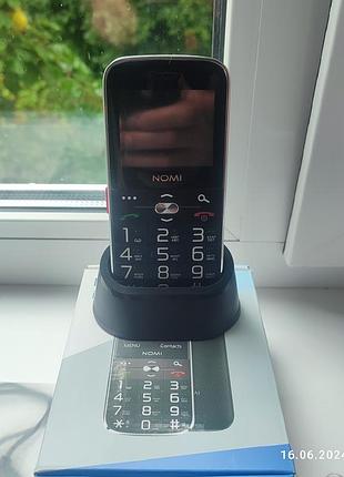 Телефон nomi новый кнопочный!