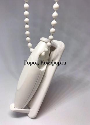 Фіксатор ланцюжка з тягарцем
