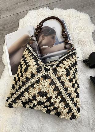 Поетена соломʼяна сумка