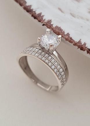 Серебряное кольцо двойное с белыми фианитами разного размера