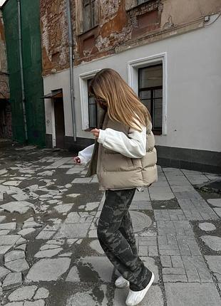 Женская жилетка