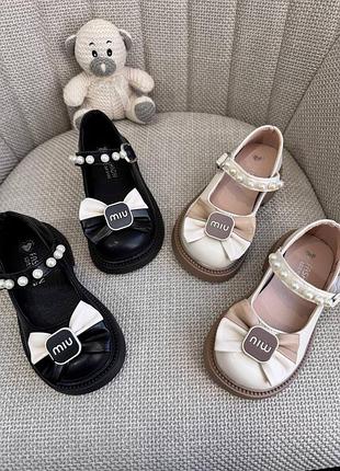 Туфлі дитячі