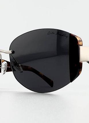 Женские солнцезащитные очки rita bradley rb9041 col.01p polarized без оправы поляризация черные
