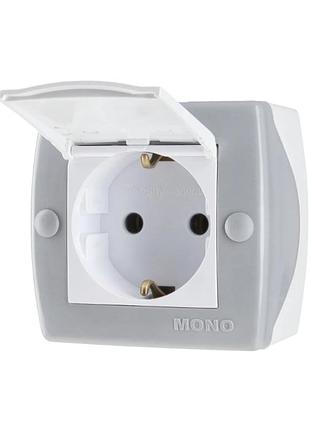 Розетка с заземлением и крышкой mono electric octans ip20 серая (104-020007-118)
