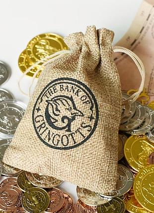 Мешочек «gringotts bank» с тремя монетами: кнат, сикль, галлеон