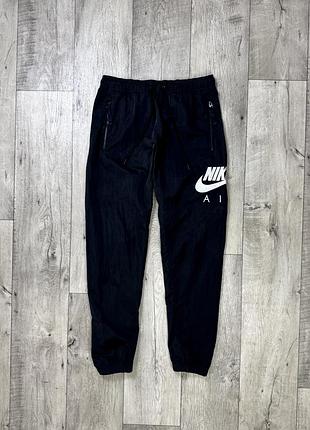 Nike air штаны s размер спортивные на манжетах черные с принтом