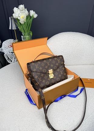 Pochette metis monogram brown