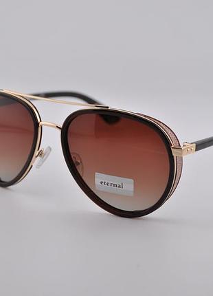 Фирменные солнцезащитные очки eternal polarized et3219 капля