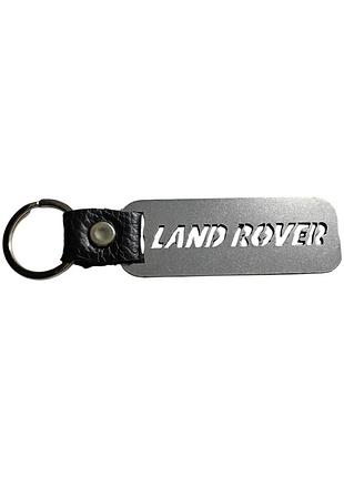 Брелок с метала и названием марки land rover