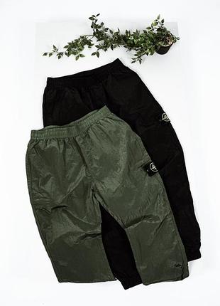 Нейлоновые брюки от stone island