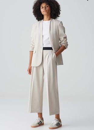 Свободные брюки модели city pants malma wide от бренда opus.