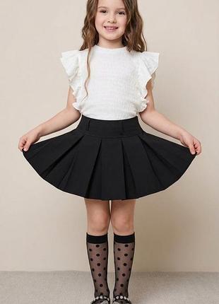Спідниця шкільна з шортами для дівчинки чорна 128-158р. стильні шорти-спідниця для дівчаток шкільні шорти-спідниця 140