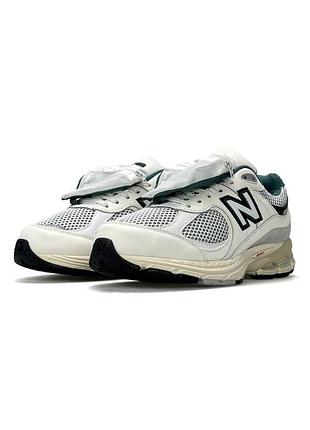 Жіночі кросівки new balance 2002r pouch beige green