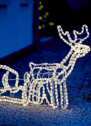Новогодняя  гирлянда - ночник , олень из санями. классный рождественский декор1 фото