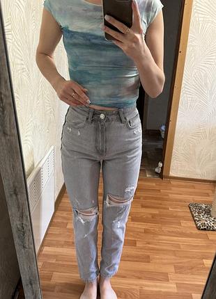 Джинси жіночі zara з рваностями 34р