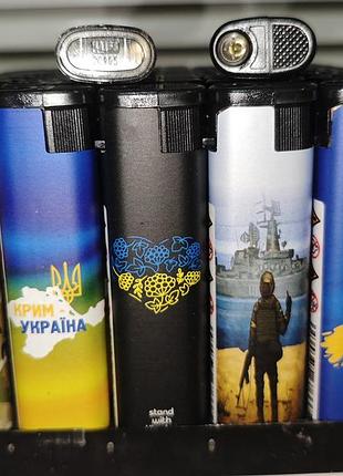 Запальнички турбо мілітарі символіка україни ціна за блок, в якому 50 запальничок.
