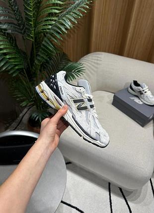 New balance 1906d protection pack reflection white/gold.