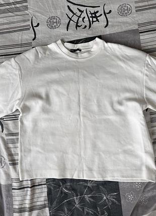 Однотонна біла футболка від бренду zara