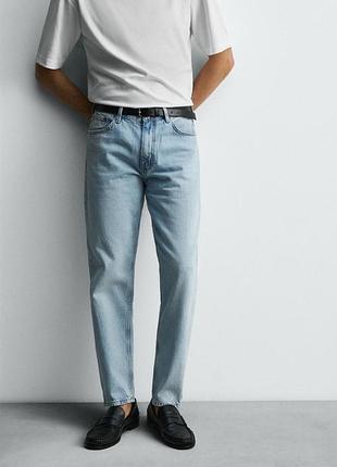 Джинси slim tapered fit виготовлені з бавовняного деніму.