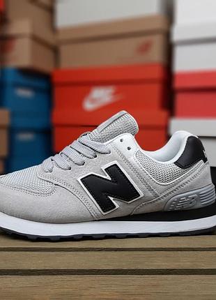 Жіночі кросівки new balance 574 classic світло сірі з чорним