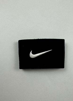 Тримач для щитків nike