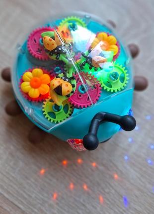 Музыкальное солнышко yj toys 14см прозрачный корпус/цветные шестерни/музыка/подсветка/проектор yj-3039