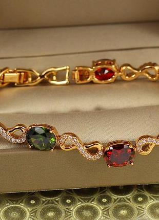 Браслет xuping jewelry вітражі часу з темними різнокольоровими каменями золотистий
