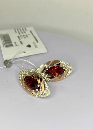 Серебряные серьги с красным камнем карамель