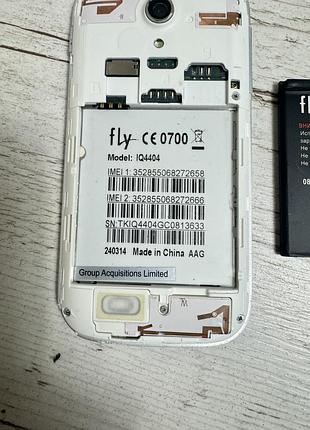 Телефон fly iq4404 7