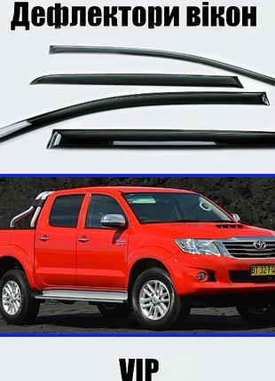 Дефлектори вікон, вітровики toyota hilux 2011 -> (скотч) vip