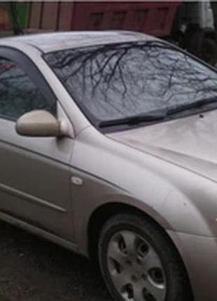 Дефлектори вікон на kia cerato седан 2004-2008 (скотч) av-tuning. вітровики на kia cerato