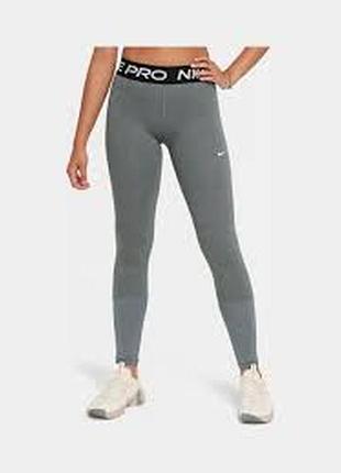 Сірі леггінси nike pro dri-fit з високою талією, розроблені для тренувань і спорту.