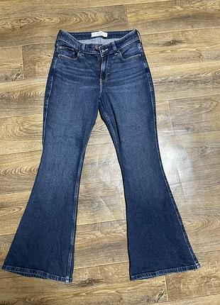 Джинси кльош сині