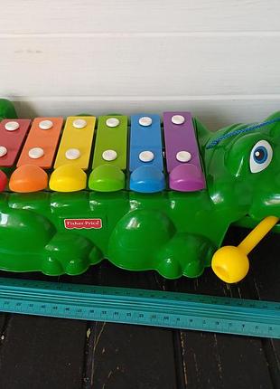 Дитяча музична іграшка  - каталка ксилофон у вигляді крокодила fisher-price crocodile xylophone.