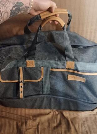 Сумка дорожня від le coq sportif з подвійним дном,оригінальна, нова