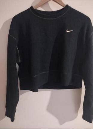 Жіночий укорочений флісовий пуловер nike dri-fit чорного кольору із золотистим рядком.