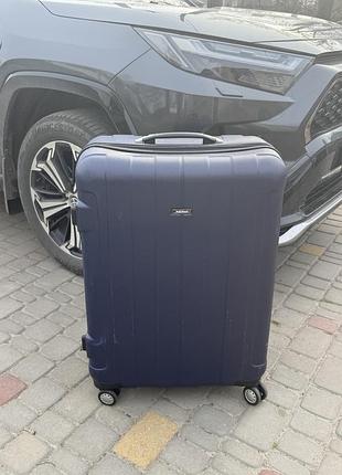 Дуже велика валіза чемодан пластик 4 колеса