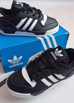 Новые оригинальные кожаные adidas р28,29,30,31 длина стельки по факту 17.5см 18.2см 18.8см
19.5см