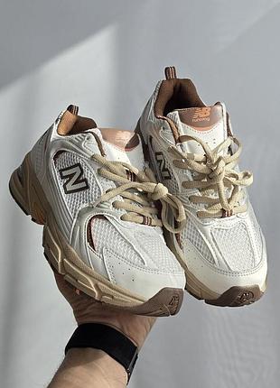 New balance 530
• cream / brown •