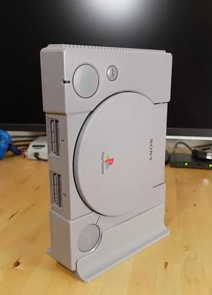 Вертикальный держатель для playstation 1 - надежная фиксация и экономия пространства!