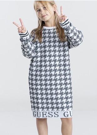 Це дитяча трикотажна сукня guess у чорно-білому гусяча лапка