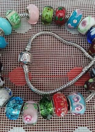 20 шерлов венецианки и муранки. серебро 925пр. клеимо pandora. 36 см. основа спец сталь. 4000 грн.