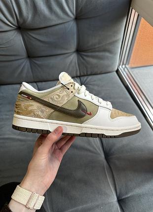 Nike dunk low кеди, які стали сучасною класикою. шкіряний вверх, зручна амортизація та стильний дизайн.